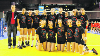 student womens volley ball team wearing team shirts